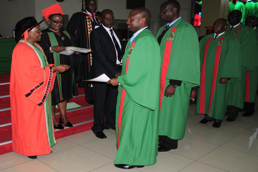 UNZA Deputy Vice-Chancellor, Prof. Enala Tembo-Mwase gives Diploma certificates in Defence and Security Studies to ZNS graduands