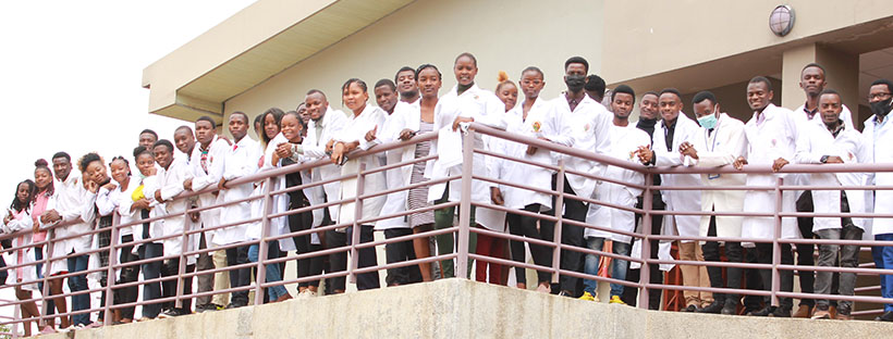 School of Public Health students from Environmental Health, Health Promotion, Public Health and Health Services pose for a photo after the White Coat Ceremony