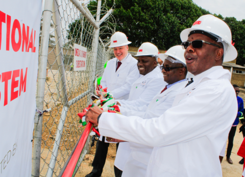 Minister of Energy Honourable Matthews Nkhuwa cutting the ribbon during the launch
