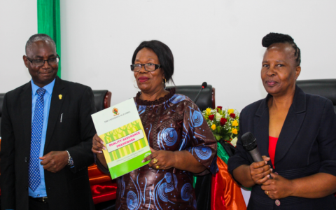 Minister of Higher Education (c) accompanied by the Vice Chancellor (l) and the Deputy Vice Chancellor (R) displays the launched Quality Assurance Framework document
