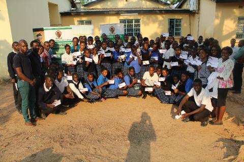 Pupils pose with certificates after the training