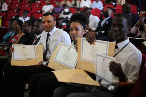 Medical students displaying their certificates