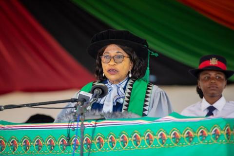 Lusaka Province Minister Sheol Mulyyata speaking at the 4th graduation ceremony